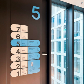 Signage and branding in the "Timber Pioneer" building in Frankfurt am Main