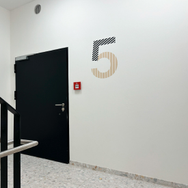 Signage and branding in the "Timber Pioneer" building in Frankfurt am Main